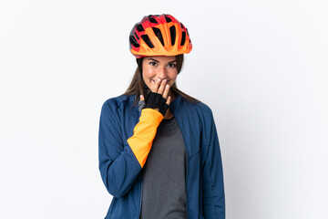 Young cyclist brazilian girl isolated on white  background happy and smiling covering mouth with hand - obrazy, fototapety, plakaty