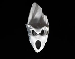 white ghost on a black background