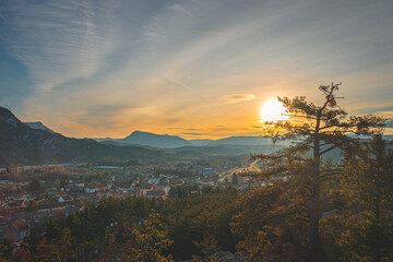 A panoramic wide landscape view of Veynes, an old town in the French Alps, during the sunset