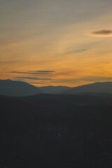 A picturesque landscape view of the French Alps mountains in the Hautes-Alpes department during the sunset