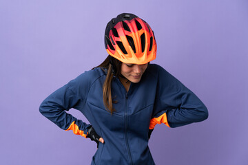 Teenager cyclist girl suffering from backache for having made an effort
