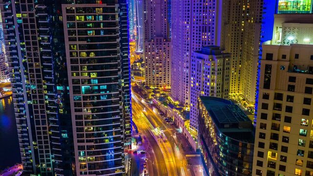 night dubai marina traffic road apartment buildings rooftop panorama 4k timelapse uae