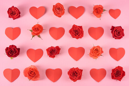 Red and orange roses and pictures of hearts. Valentine's day pattern.