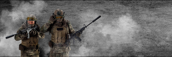 A mercenary soldiers during a special operation. Photo with copy space. Collage - one model, in two poses.