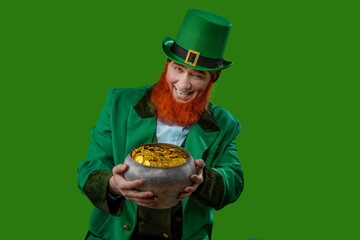 Leprechaun elf on St. Patrick's Day. Cheerful character Irish leprechaun for advertising with a red...