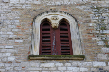 Fototapeta na wymiar Manoppello - Abruzzo - Abbey of Santa Maria d'Arabona - External lunettes of the balconies and windows