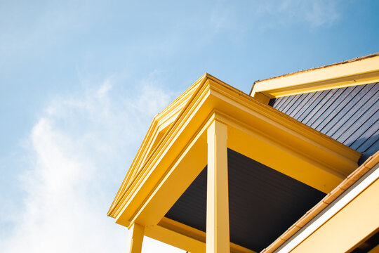 Yellow House Under Blue Sky