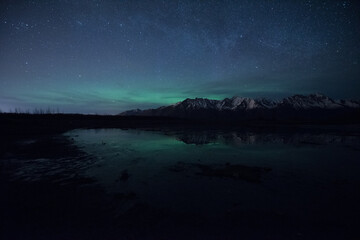 Naklejka na ściany i meble Northern Lights or Aurora Borealis in Alaska