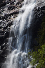 Mountain watefall in Norway during spring. Reiarsfossen. Norway
