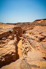 yellow sand mountains, catacombs, stairs, stones, rocks