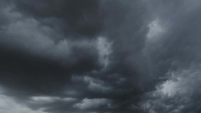 Dramatic dark storm clouds are moving fast, 4k