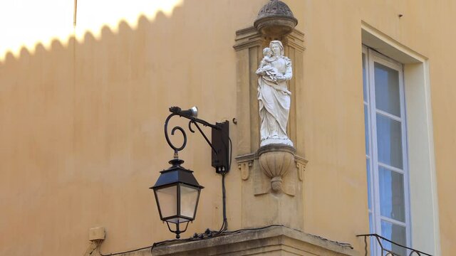 Virgin Mary holding baby Jesus in her arms oratory at the corner of the Cours Mirabeau avenue in Aix en Provence