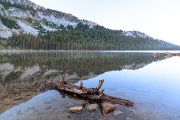 Reflecting Lake by Mountainside in Yosemite National Park California During a Foggy Morning
