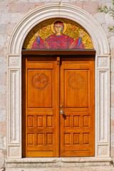 Fototapeta na wymiar colourful wooden ornate door