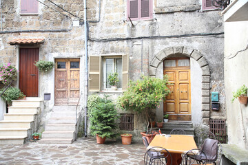 A peaceful characteristic glimpse of some houses of the town of Tuscania, Tuscia, Lazio, Italy 