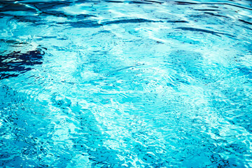 Blue water wave. Pool water texture surface. Summer sea abstract pattern.