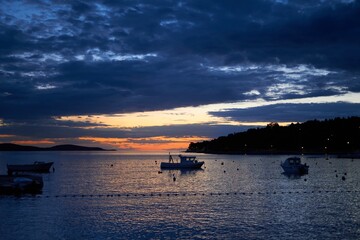 Seascape at sunset - small port in Croatia, Adriatic sea, Dalmatia, Europe.