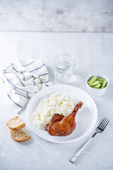 Peking duck with rice on a plate