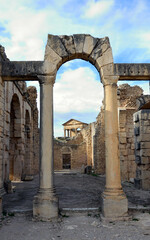 Baths of Licinius, Temple of Jupiter and some other ancient roman ruins of Dougga in Tunisia, Africa in the sunny afternoon