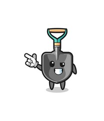 shovel mascot pointing top left