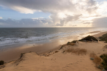 Mazagon beach, in the province of Huelva, Spain. One of the most beautiful beaches in Spain. Concept of going to the most beautiful places on vacation.