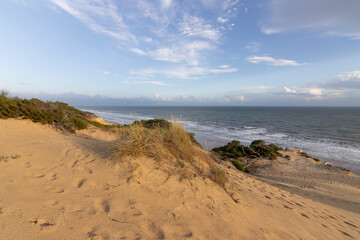 Mazagon beach, in the province of Huelva, Spain. One of the most beautiful beaches in Spain. Concept of going to the most beautiful places on vacation.