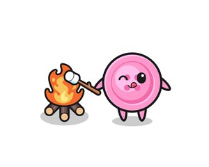 clothing button character is burning marshmallow