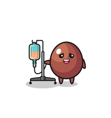 cute chocolate egg character standing with infusion pole