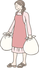 ゴミ出しをする女性