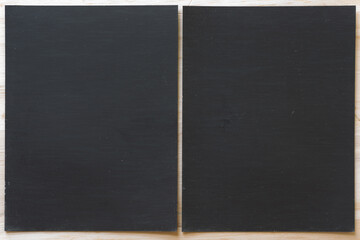 two dark gray magnetic sheets (rectangles) on white