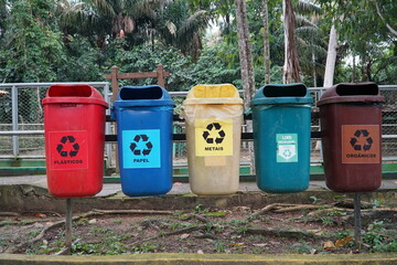 Five color waste separation system with plastics, paper, metals, recyclable liquids and organics...