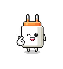 power adapter character doing Korean finger heart