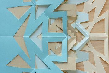 cut paper shapes (not necessarily snowflakes)