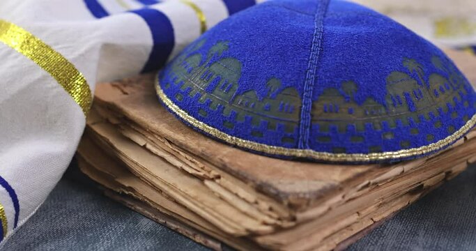 Jewish prayer book with torah scroll and shofar horn, prayer shawl tallit Orthodox religious symbols