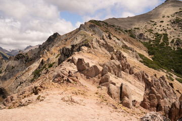 Alpine landscape. View of the rocky mountain peak of Bella Vista hill in Bariloche, Patagonia Argentina. Beautiful rock texture and colors. 
