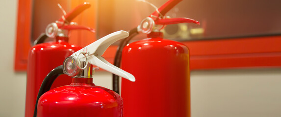 Fire extinguisher, Close-up red fire extinguishers tank in the building concepts of protection and...