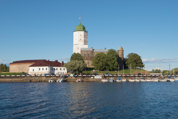 Fototapeta na wymiar View of the medieval Vyborg castle from the South Harbor on a sunny August day. Vyborg, Russia