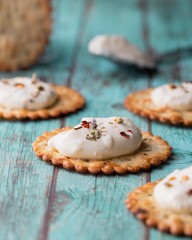 Macro shot of cream cheese on salted crackers