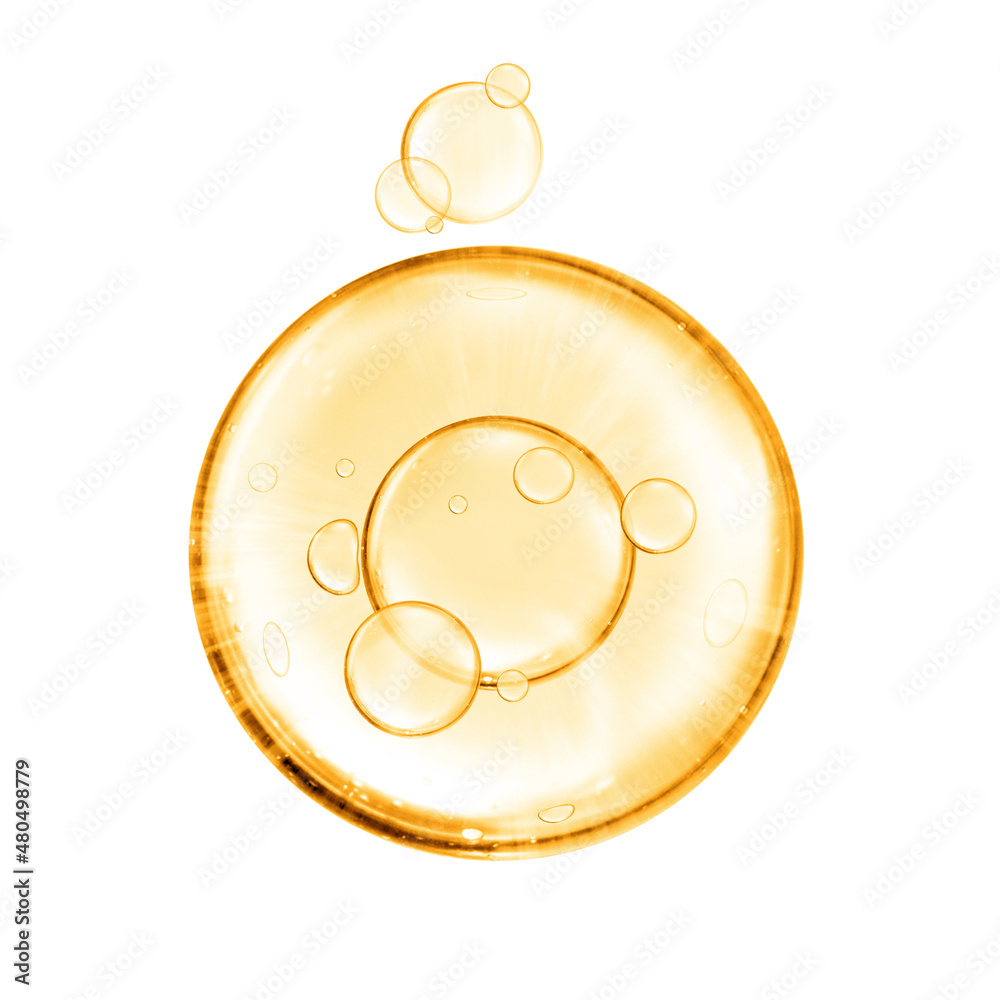 Wall mural golden miracle yellow bubble oil or serum isolated on white background. beauty and skincare