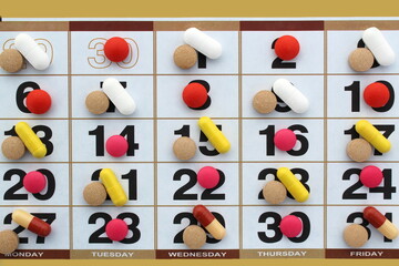 On a sheet of the calendar are medicines for every day.