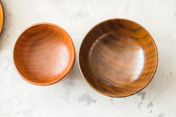 Wood bowls. Food background for menu and recipe or restaurant. Table setting