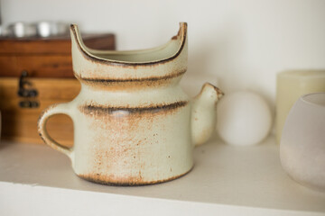 Vintage Grey tea pot on gray background.