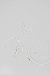 Beauty, skincare product setting. Transparent cosmetic gel smear on white background