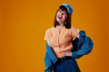 Portrait of a charming lady stylish denim clothing posing color background unaltered