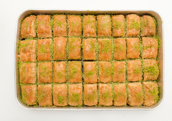 Baklava is a special Turkish dessert made with a mixture of dough, sherbet and nuts such as pistachios.