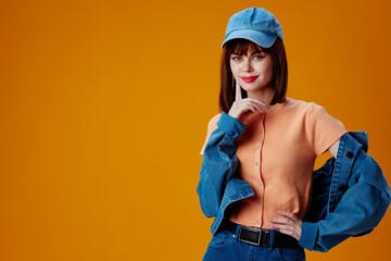 Positive young woman denim cap red lips glamor fashion color background unaltered