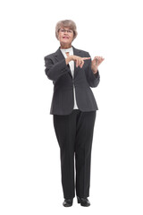 Happy mature woman with key on white background