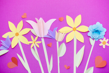 Paper art, bright summer holiday handmade flowers, craft on a pink background.. Colorful postcard for Mother's Day, Easter