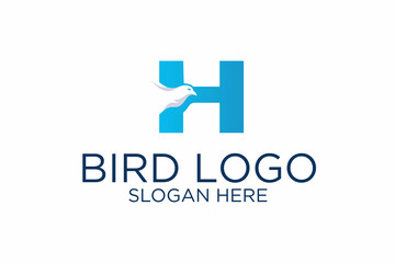bird logo design and initial letter h. premium vector