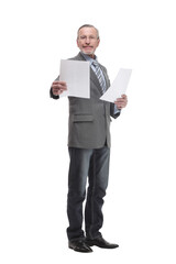 Full length portrait of a mature businessman looking at documents